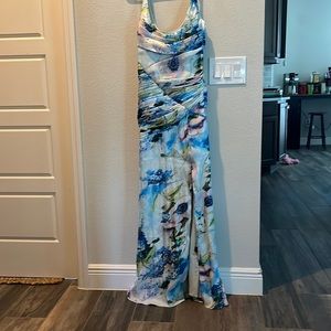 Theia designer long gown. Draped to create a beautiful feminine shape. NWT
